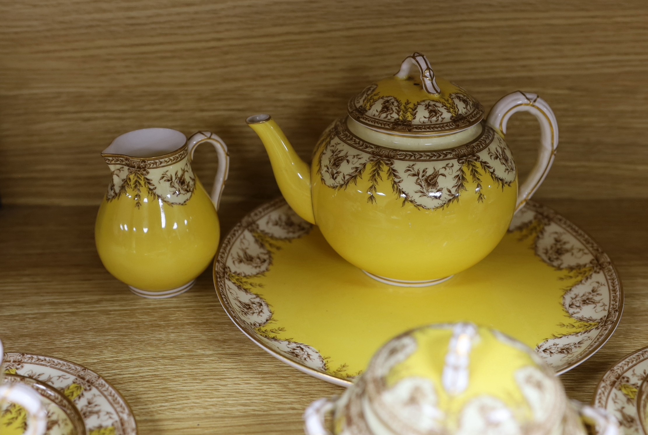 A yellow ground Worcester porcelain tea set